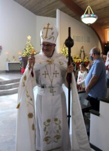 A bishop wearing a white Pontifical vestment